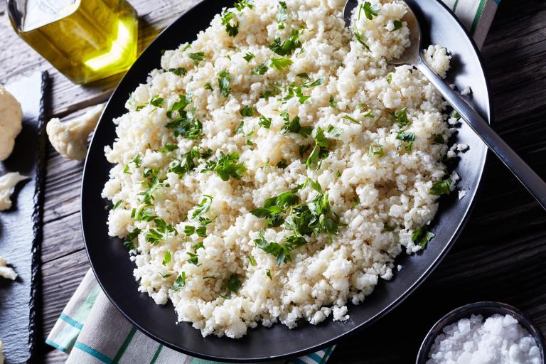 a bowl of grated cauliflower couscous